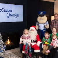 Family of 5 with Santa and Louie